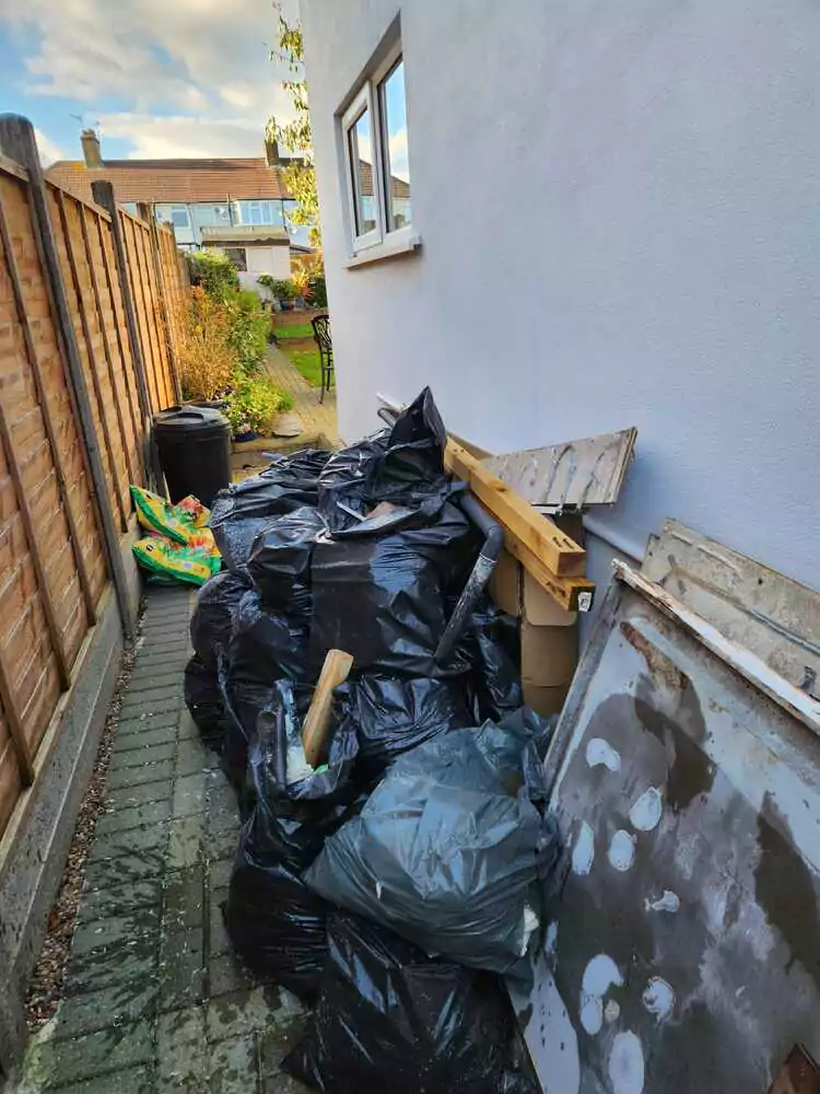 Swifty Clearances before cleaning out garden rubbish in a property in Hertfordshire